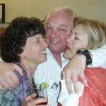 Larry Dorsett enjoys a moment with Barbara & Cheryl